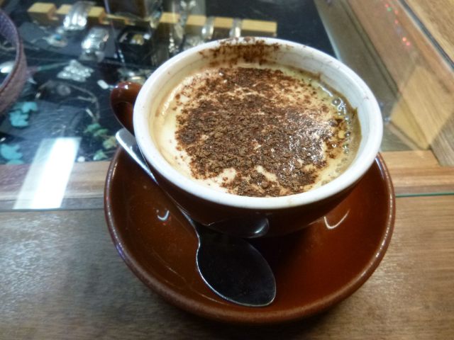 This delicious drink was called a Latin Latte. Espresso made with the sugar right in with the coffee grounds so the water goes through both, steamed evaporated milk